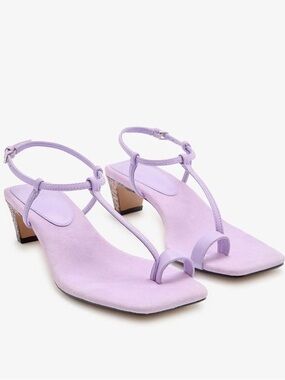 ZARA Limited edition lilac suede sandals with low heel.